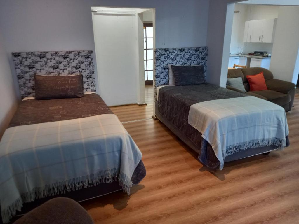 Postel nebo postele na pokoji v ubytování Villa Agape