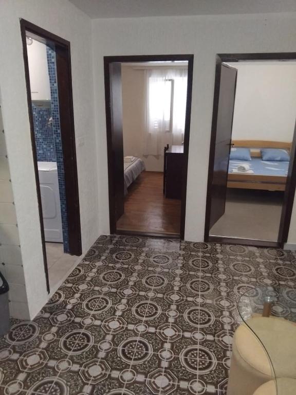 Postel nebo postele na pokoji v ubytování Apartments Vuk&Jovan