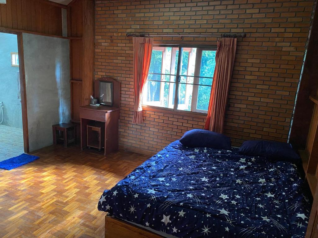 Postel nebo postele na pokoji v ubytování Shaya Homestay & Dorms