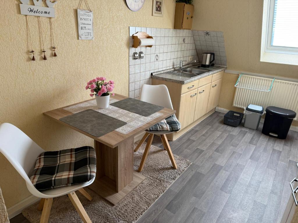 Kuchyň nebo kuchyňský kout v ubytování Ferienwohnung Büll