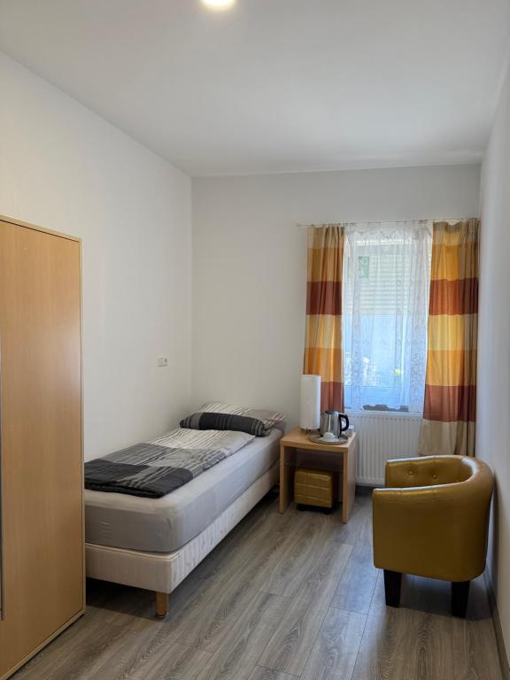Postel nebo postele na pokoji v ubytování CoBa Restaurant & Hotel