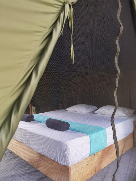 Postel nebo postele na pokoji v ubytování Block 5 Safari Camp - Yala National Park