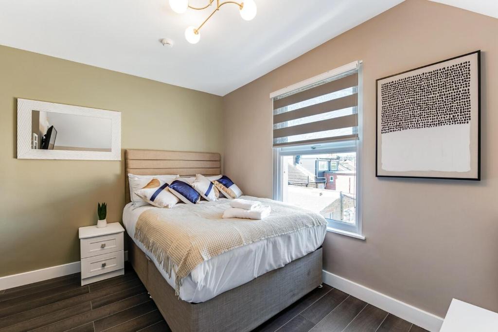 Ένα ή περισσότερα κρεβάτια σε δωμάτιο στο Charming Studio in Excellent Location 10