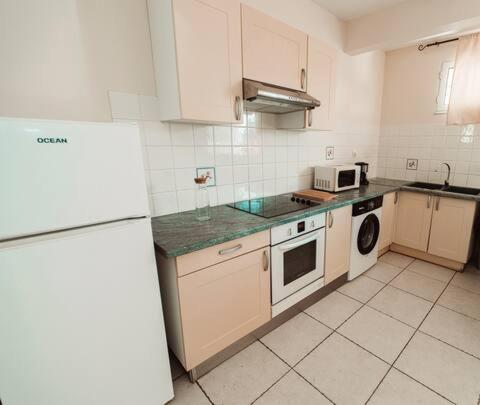 Kuchyň nebo kuchyňský kout v ubytování Rubis Appartement - Magnifique F3