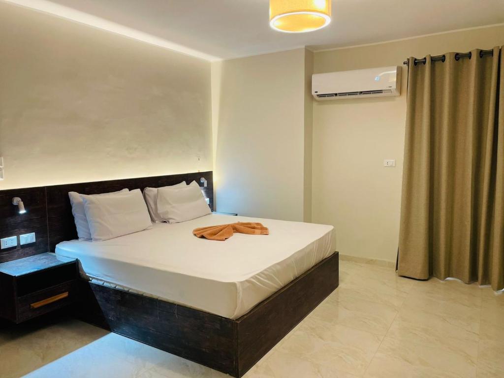 Llit o llits en una habitació de Rivera Hostel