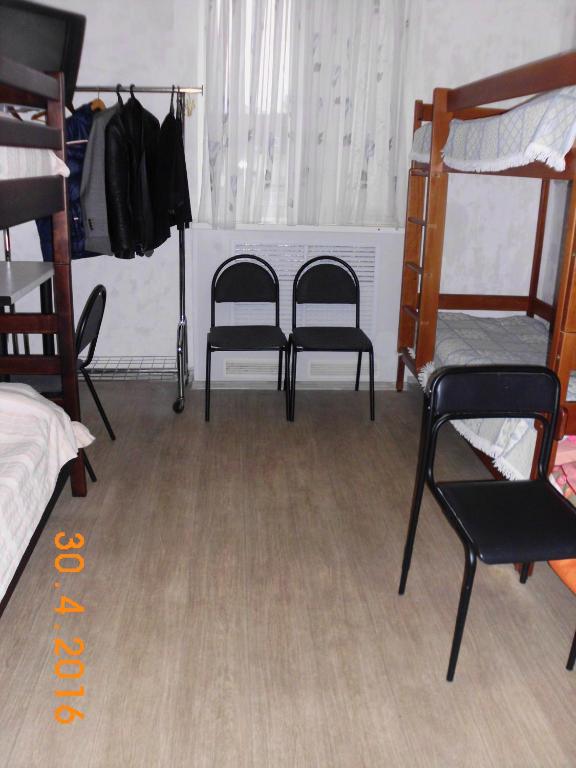 Postel nebo postele na pokoji v ubytování Kharkov CITIZEN