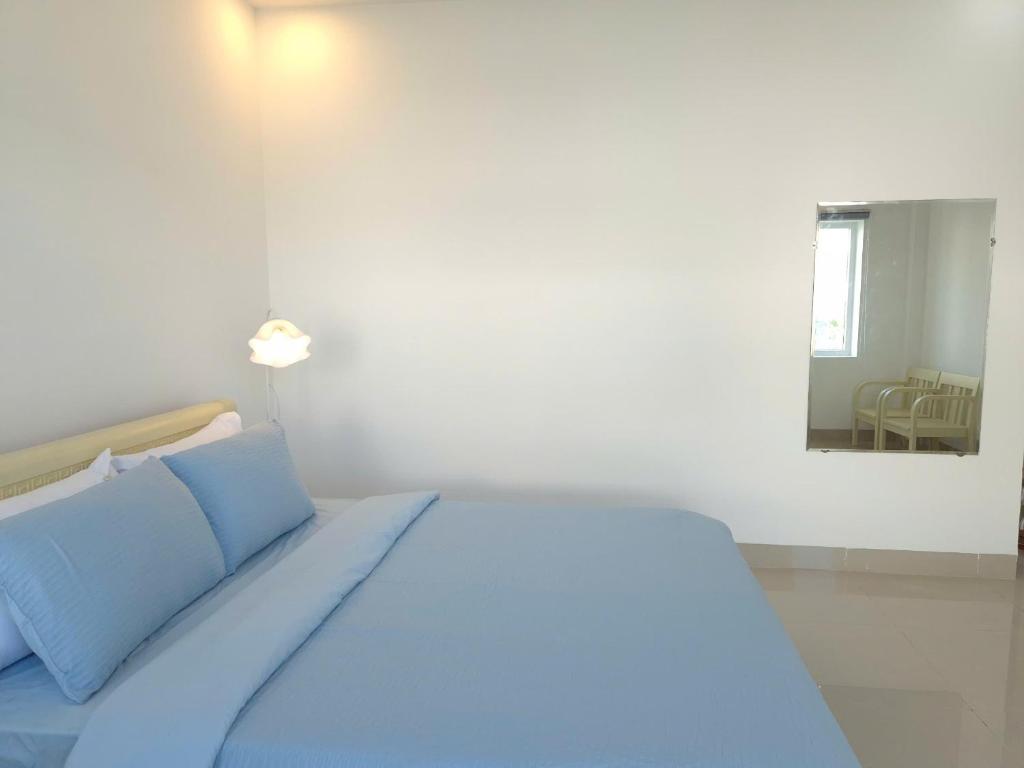 Letto o letti in una camera di An Home - Phòng đơn ngay bãi sau Vũng Tàu