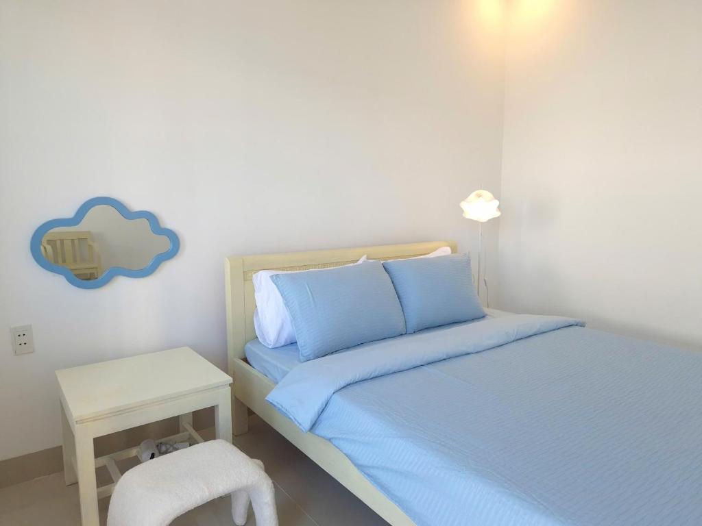 Letto o letti in una camera di An Home - Phòng đơn ngay bãi sau Vũng Tàu