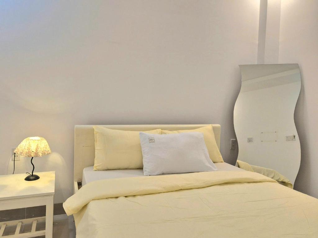 Letto o letti in una camera di An Home - Phòng đơn ngay bãi sau Vũng Tàu