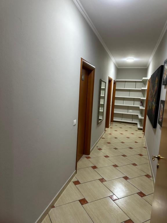 Televiisor ja/või meelelahutuskeskus majutusasutuses Rooms Dionis
