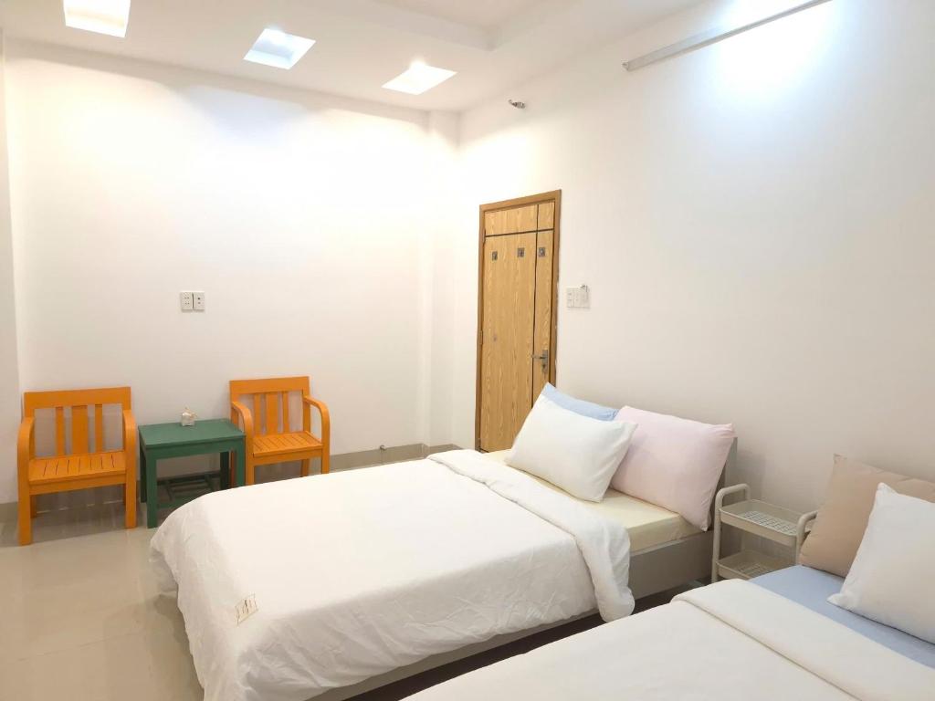 Letto o letti in una camera di An Home - Phòng đơn ngay bãi sau Vũng Tàu