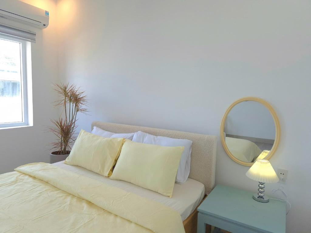 Letto o letti in una camera di An Home - Phòng đơn ngay bãi sau Vũng Tàu