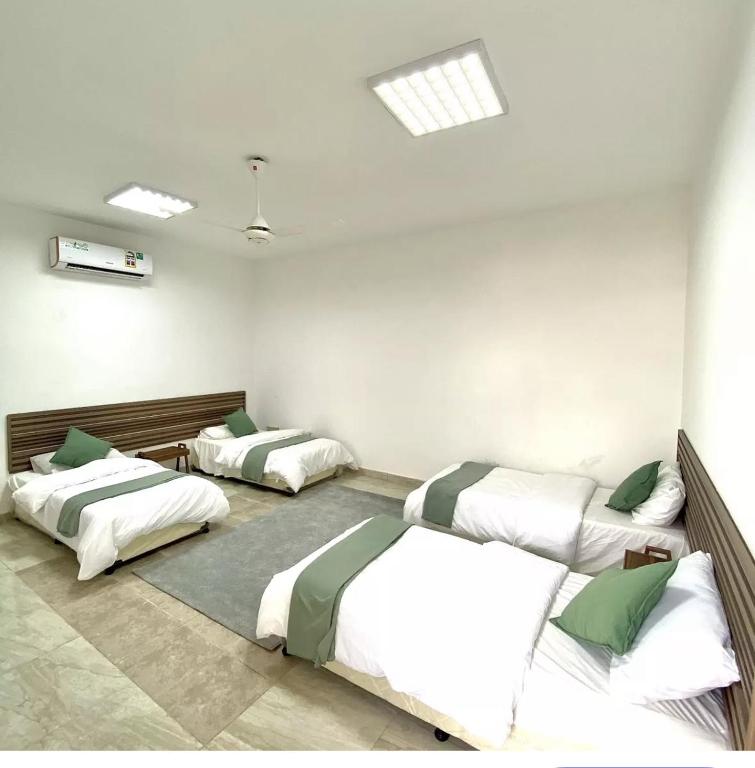 Llit o llits en una habitació de Bait Al-Saif