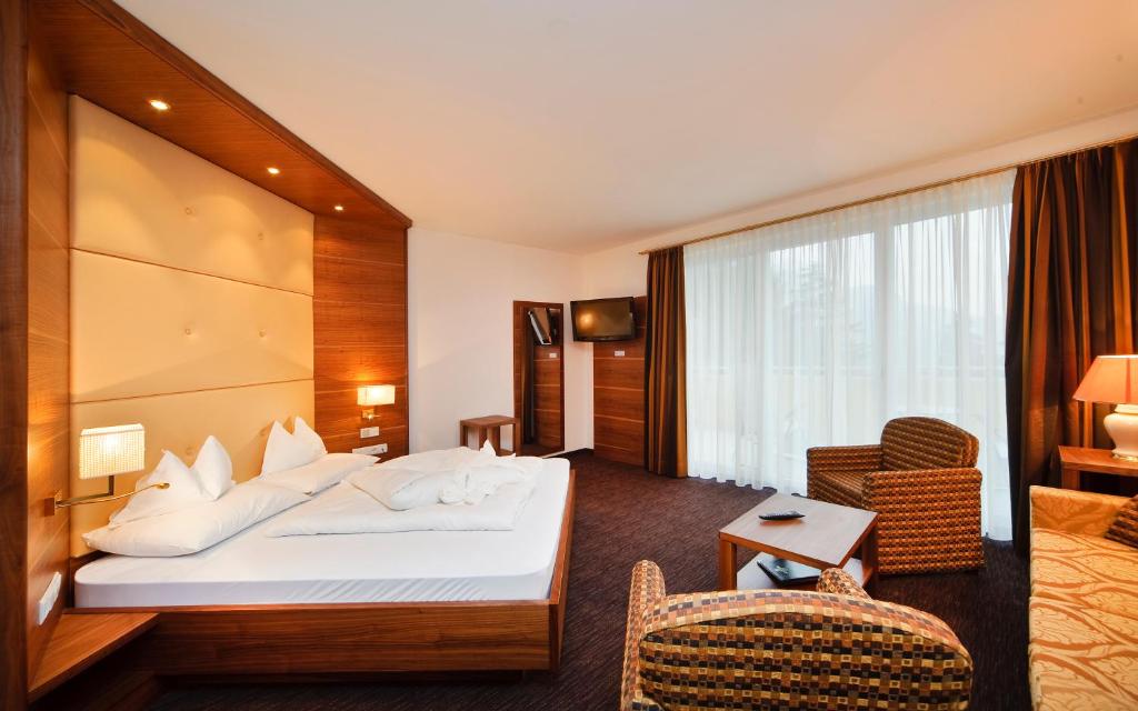 Postel nebo postele na pokoji v ubytování Hotel Anatol