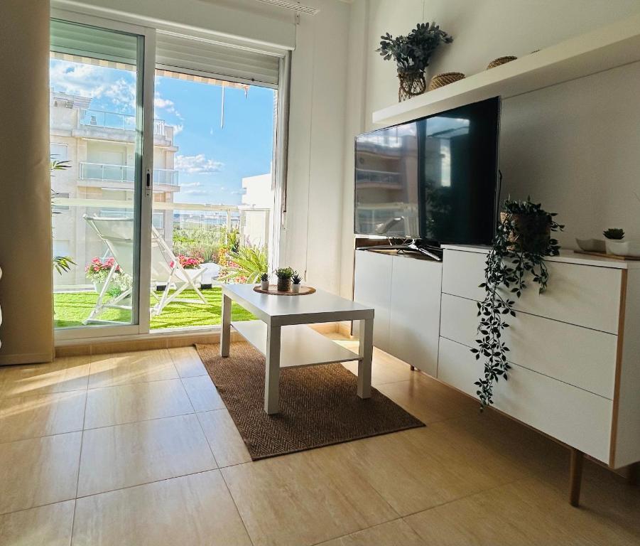 TV a/nebo společenská místnost v ubytování Marina Gaviota Beach