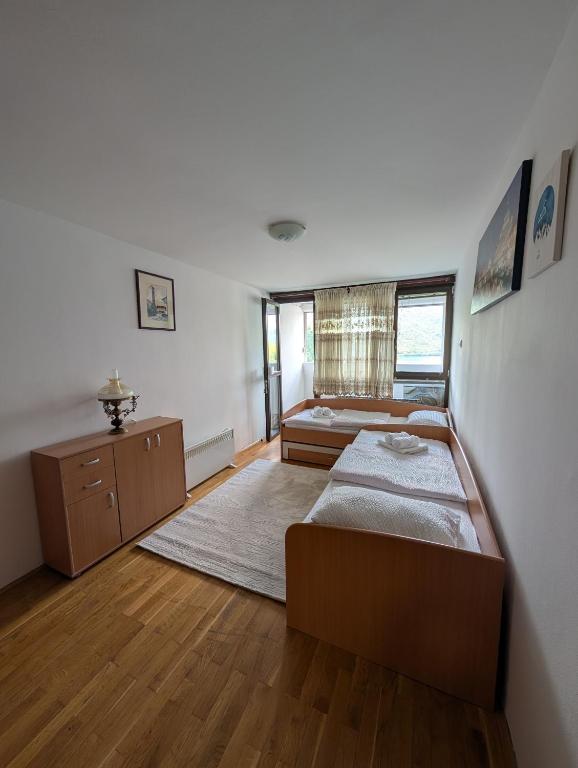 Postel nebo postele na pokoji v ubytování NiceOneLakeView