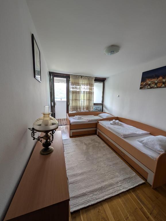 Postel nebo postele na pokoji v ubytování NiceOneLakeView