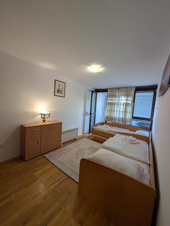 Postel nebo postele na pokoji v ubytování NiceOneLakeView