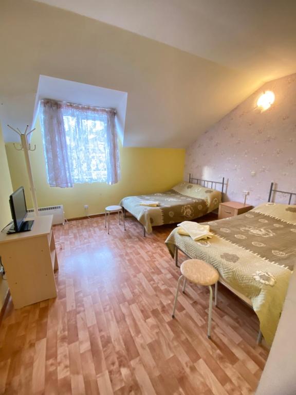 Postel nebo postele na pokoji v ubytování Osobyi Guest house