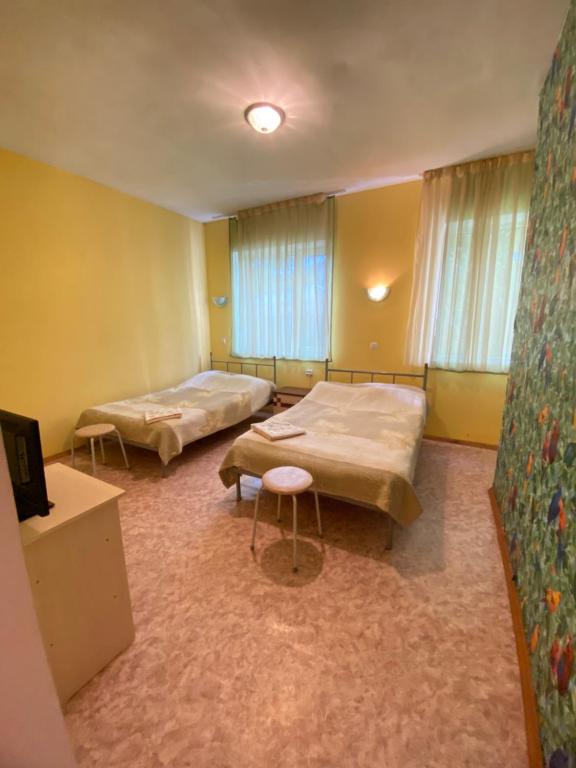 Postel nebo postele na pokoji v ubytování Osobyi Guest house