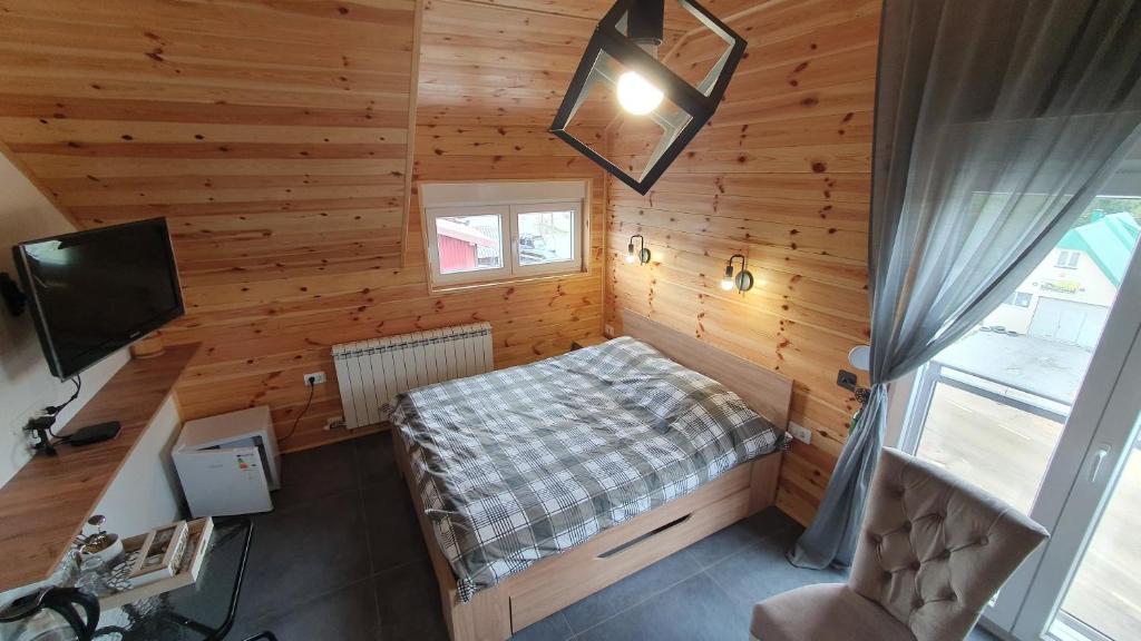TV a/nebo společenská místnost v ubytování VIP Durmitor