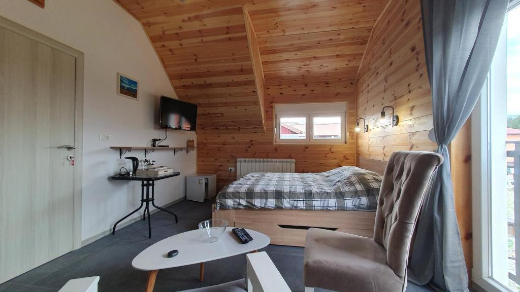 Postel nebo postele na pokoji v ubytování VIP Durmitor