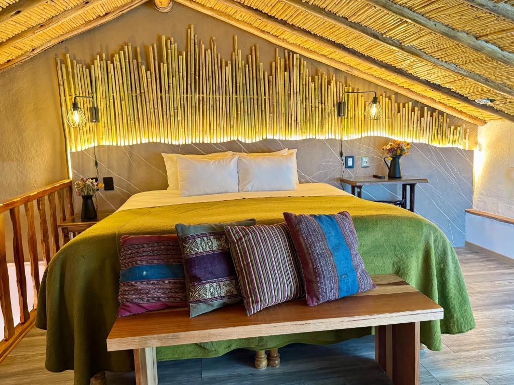 Postel nebo postele na pokoji v ubytování ARQUEOLOGO Exclusive Boutique Hotel Cusco - Centro Histórico