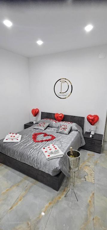 Кровать или кровати в номере Da Tonino luxury apartments