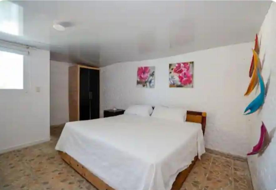 Postel nebo postele na pokoji v ubytování Dios es Fiel - Ali Hotel