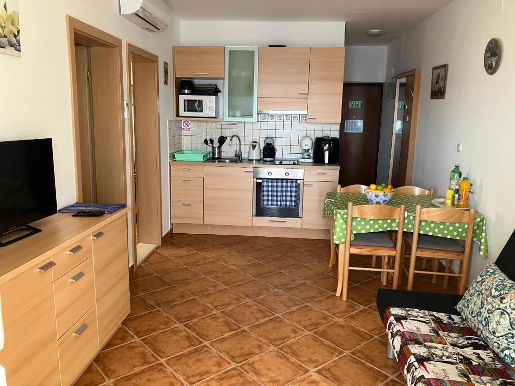 Kuchyň nebo kuchyňský kout v ubytování Apartment Andrea