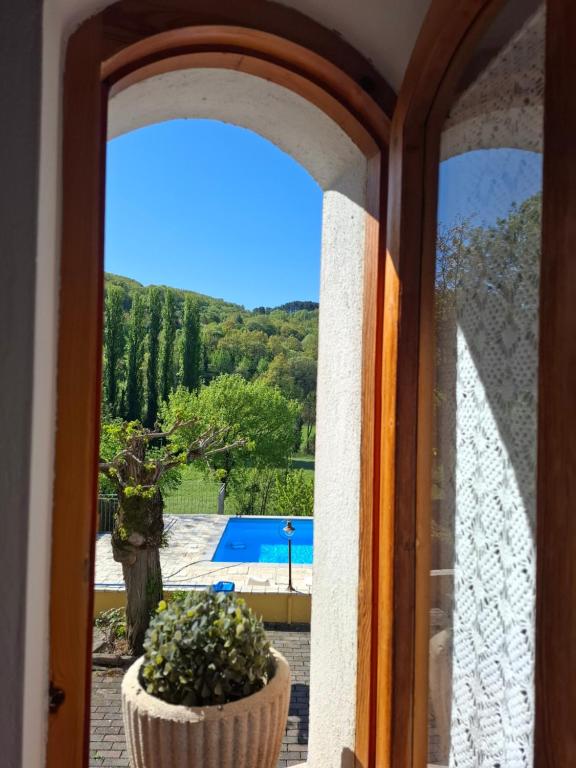 Bazén v ubytování B&B VILLA GINEVRA nebo v jeho okolí