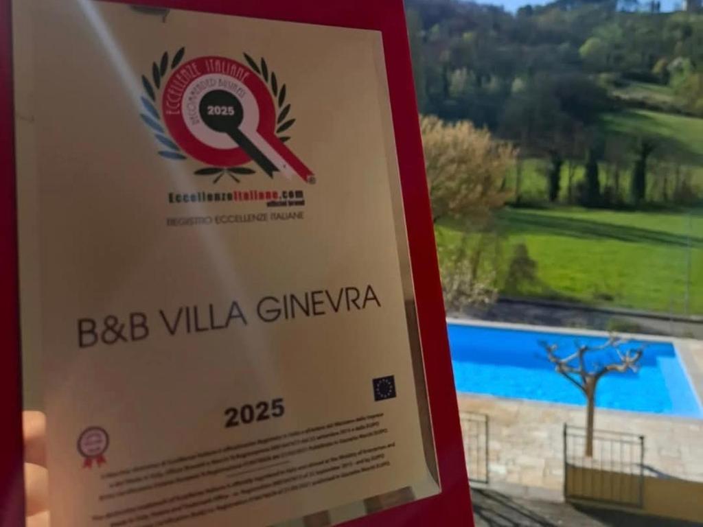 Bazén v ubytování B&B VILLA GINEVRA nebo v jeho okolí