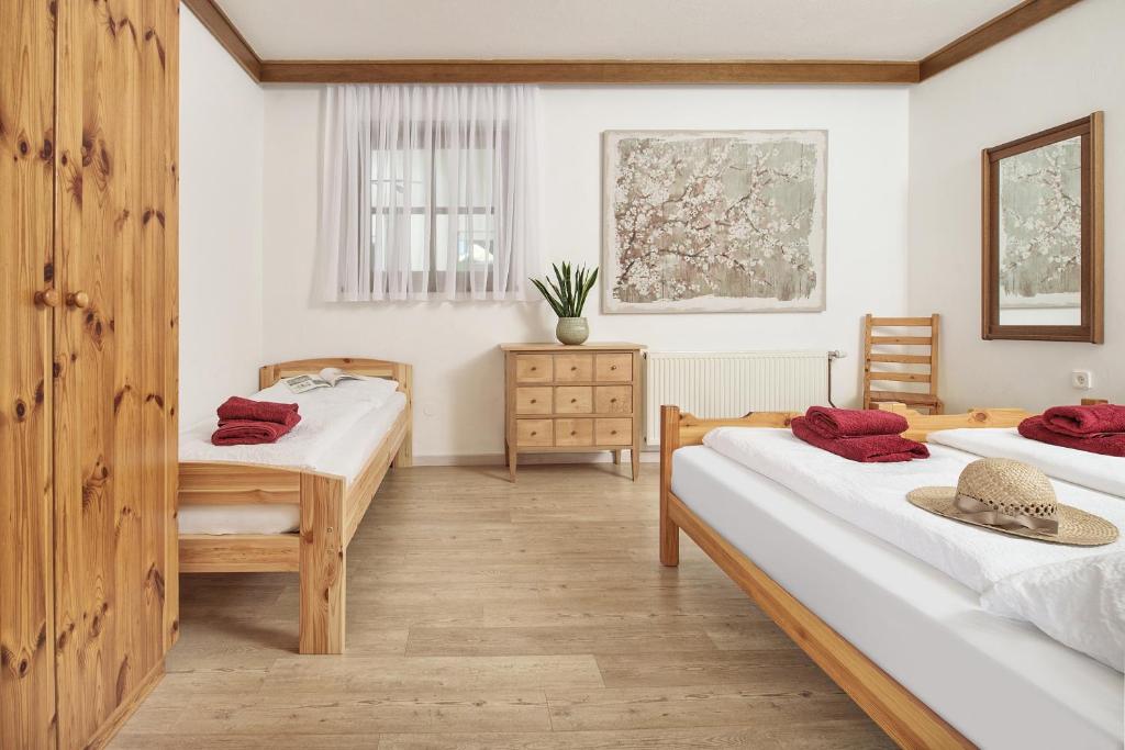 Postel nebo postele na pokoji v ubytování Appartement Haus Drobollach