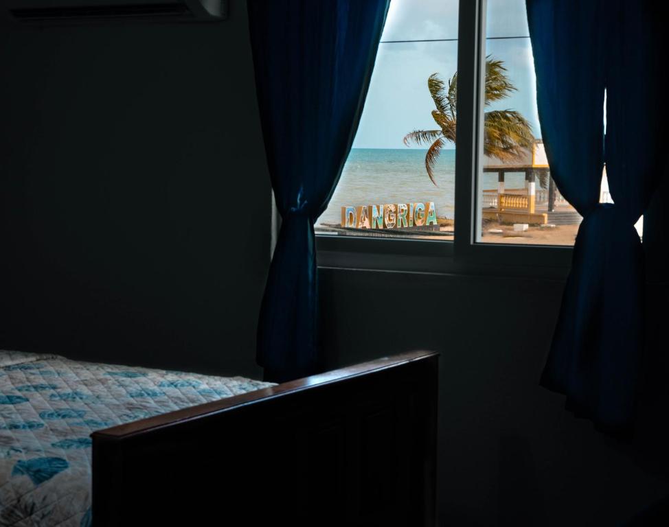 Postel nebo postele na pokoji v ubytování Bonefish Hotel