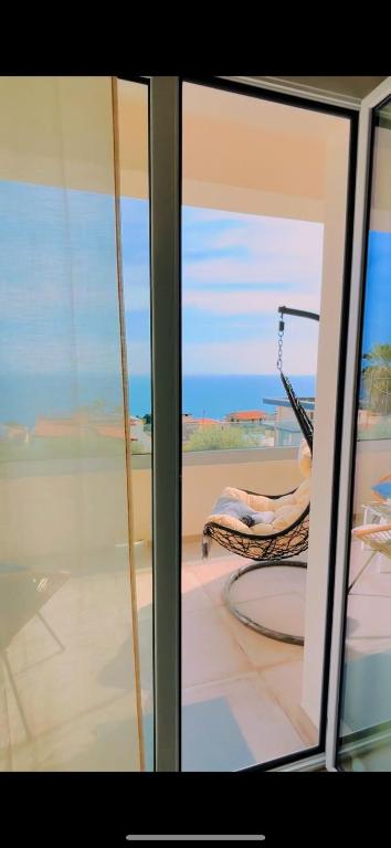 a view from a window of a room with a chair at Cori di Capreria in Marina di Palma