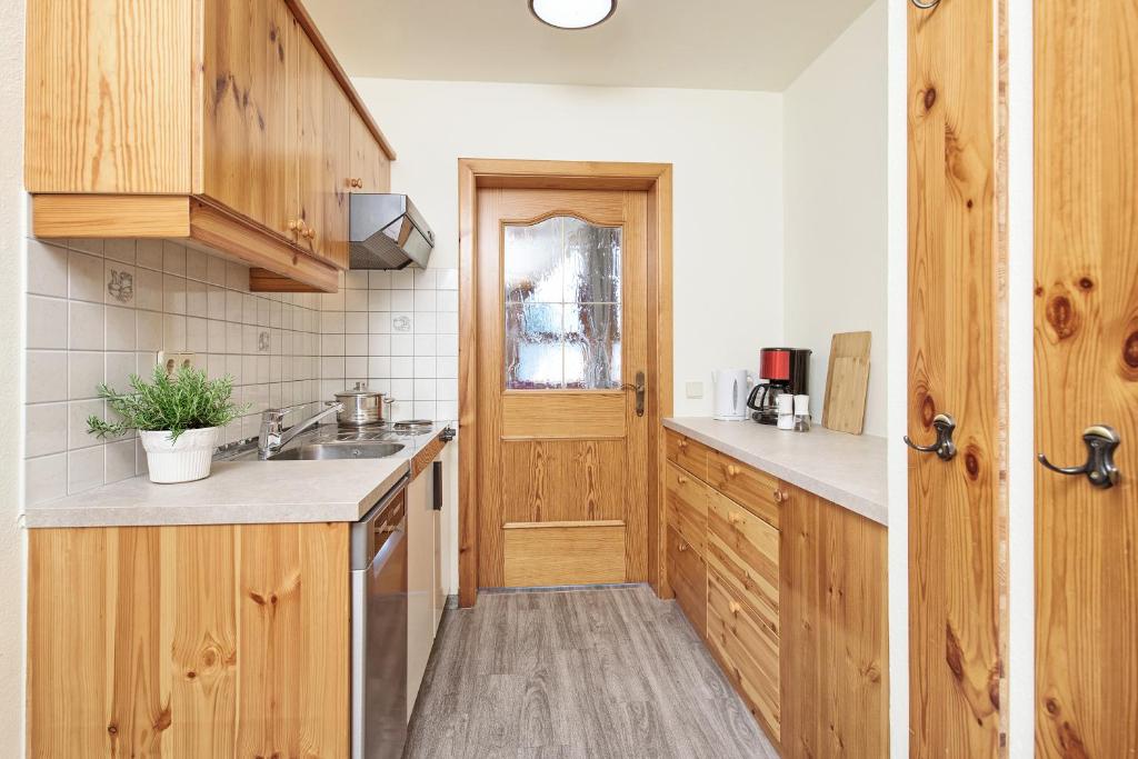Kuchyň nebo kuchyňský kout v ubytování Appartement Haus Drobollach