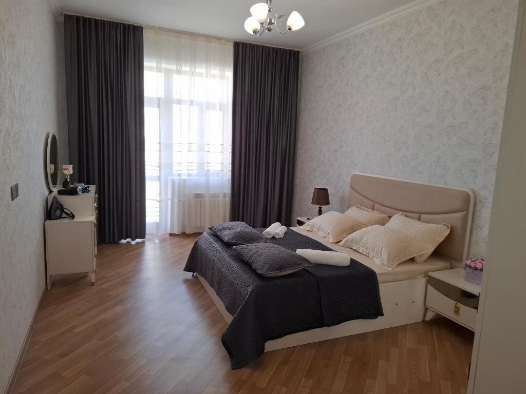 Posezení v ubytování Квартира недалеко от центра на берегу Каспия