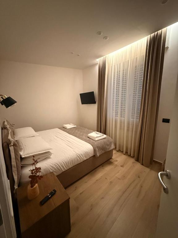 Postel nebo postele na pokoji v ubytování Bala Dream House