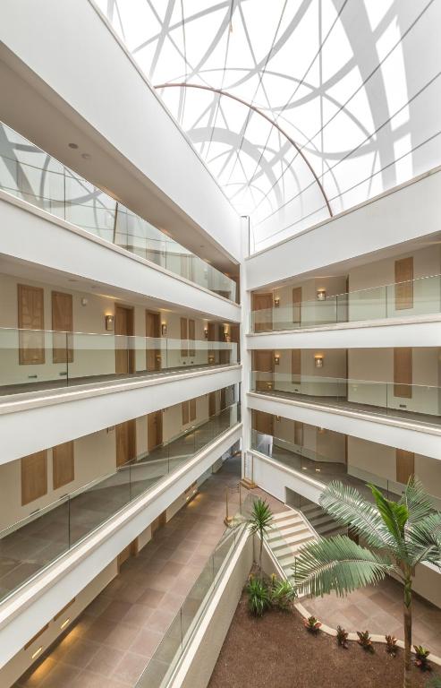 an interior view of a building with a glass ceiling at Boyalik Beach Hotel & Spa Cesme in Çeşme
