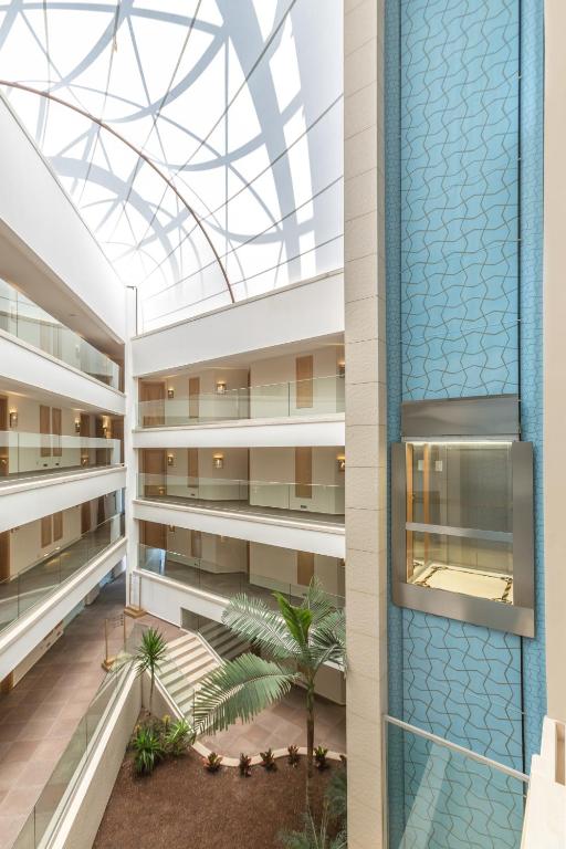 a view of therium of a building with a glass ceiling at Boyalik Beach Hotel & Spa Cesme in Çeşme