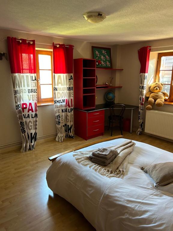 Posteľ alebo postele v izbe v ubytovaní Gîte La maison de Jules