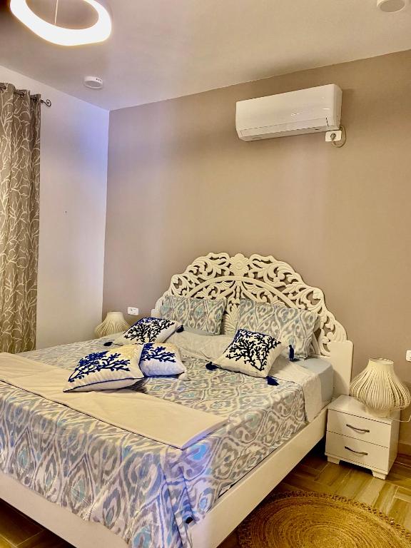 Postel nebo postele na pokoji v ubytování Villa Papaya - Djerba
