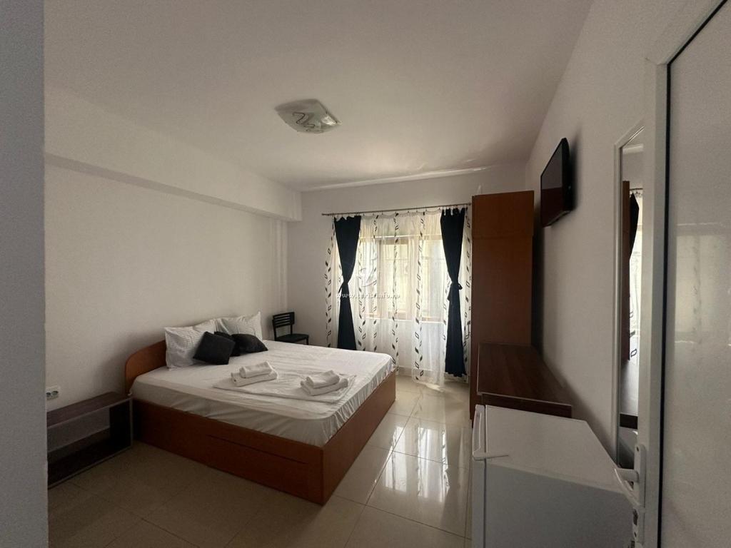 En eller flere senge i et værelse på Casa Costinesti by Genco