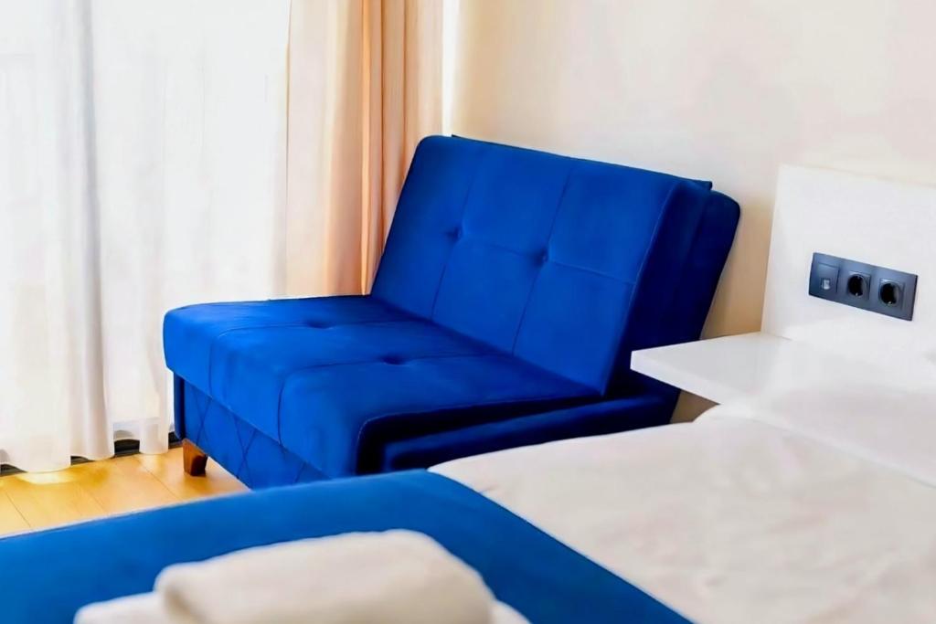 Postel nebo postele na pokoji v ubytování ORBI CITY BLACK SEA VIEW BEACHFRONT KING APARTHOTEL BATUMi