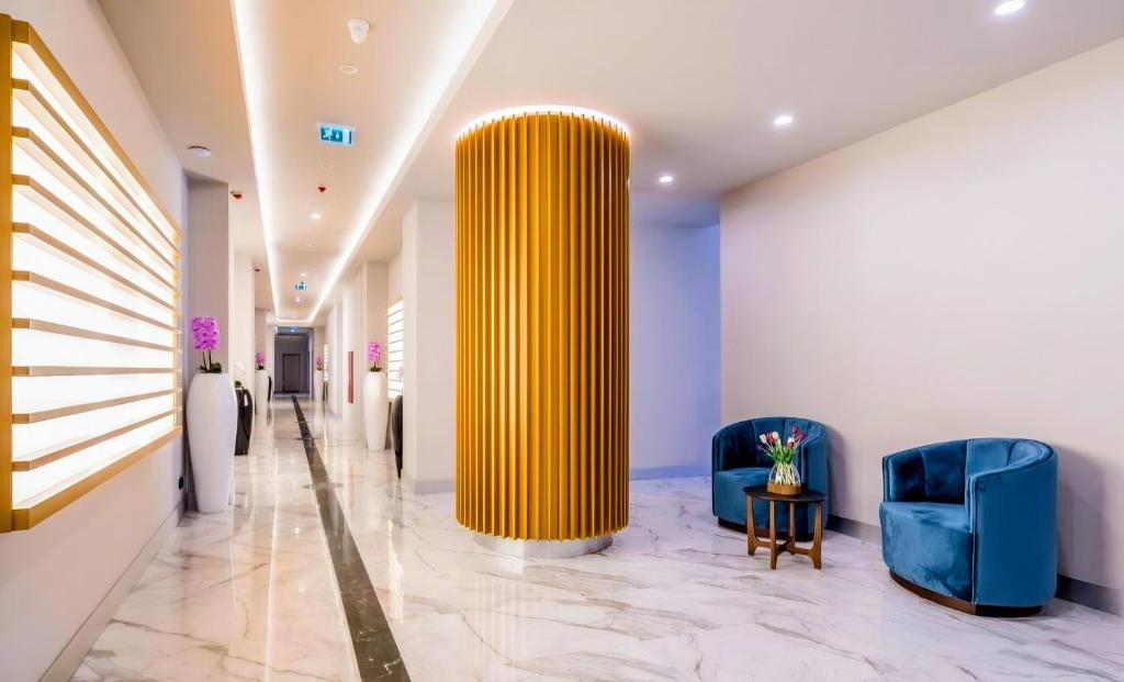 Posezení v ubytování ORBI CITY BLACK SEA VIEW BEACHFRONT KING APARTHOTEL BATUMi