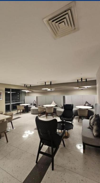 Posezení v ubytování Novotel Residence Hotel Manila by Jolly Luxe Suites at Acqua