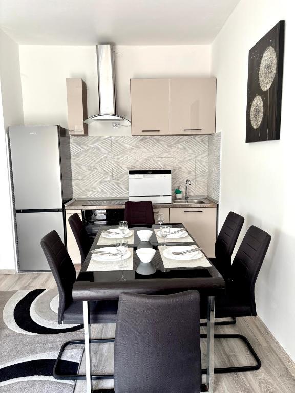 Kuchyň nebo kuchyňský kout v ubytování Apartman Djordjevic