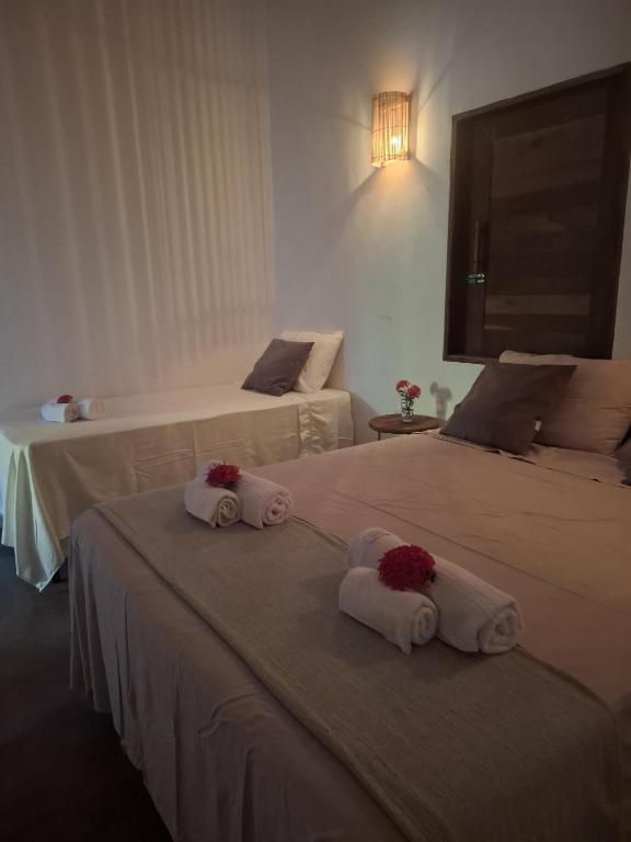 Postel nebo postele na pokoji v ubytování Casa Ninho