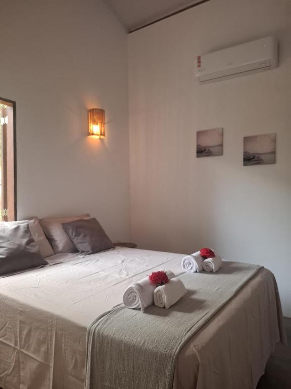 Postel nebo postele na pokoji v ubytování Casa Ninho