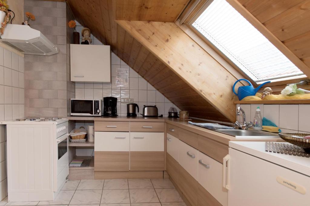 Kuchyň nebo kuchyňský kout v ubytování Gästehaus Hauser